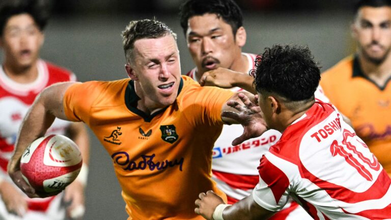 Australia survive late Japan rally as new coach Kiss makes winning start